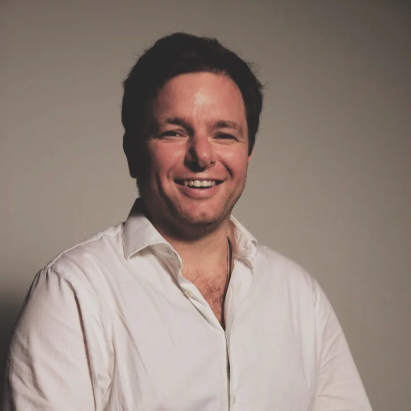 Headshot of Dan Misra Jones, Chief Financial Officer at Longbottom & Co.