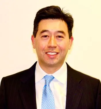 Headshot of David Tom, co-president at VCFA Group.