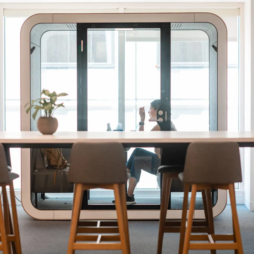 Image of person in meeting booth