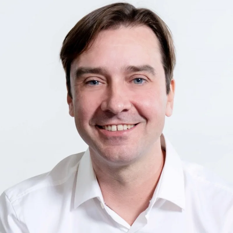 Headshot of Brian Caroll, partner at M13.