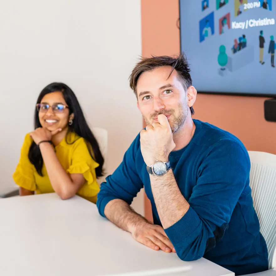 Image of two people sitting