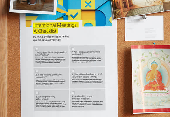 A printout of the Intentional Meetings checklist is shown pinned to a cork board.