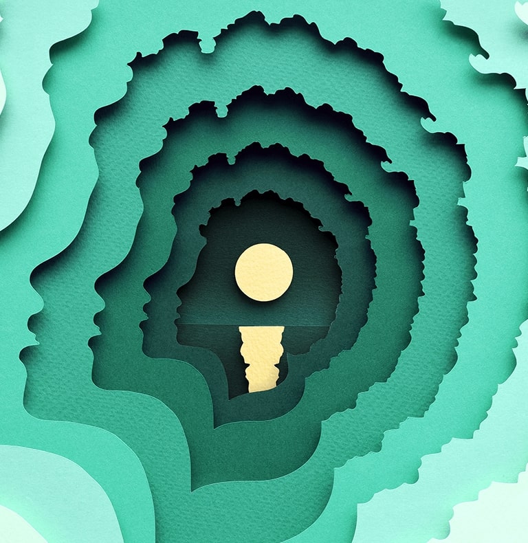 Abstract paper cut illustration of concentric woman's silhouette in profile with moon over water at the center