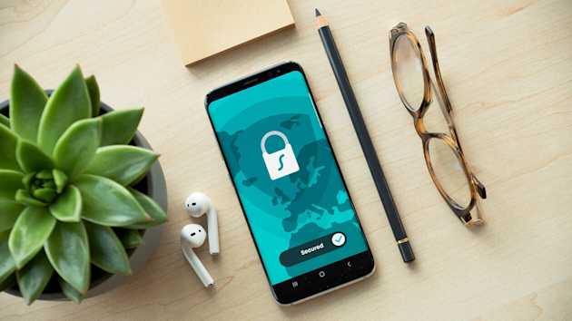 Phone on desk with security screen