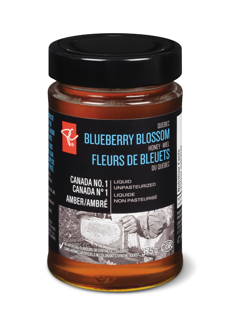 A jar of PC Black Label Quebec Blueberry Blossom Honey
