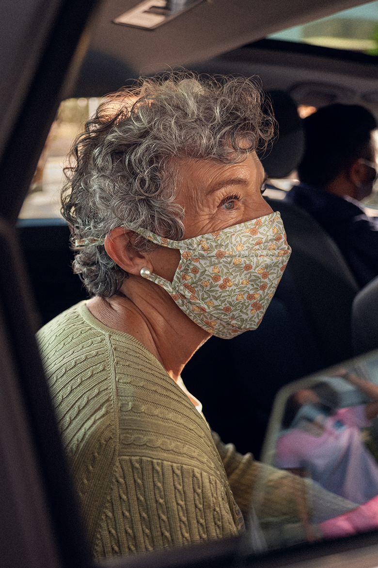 Woman sitting in Lyft car