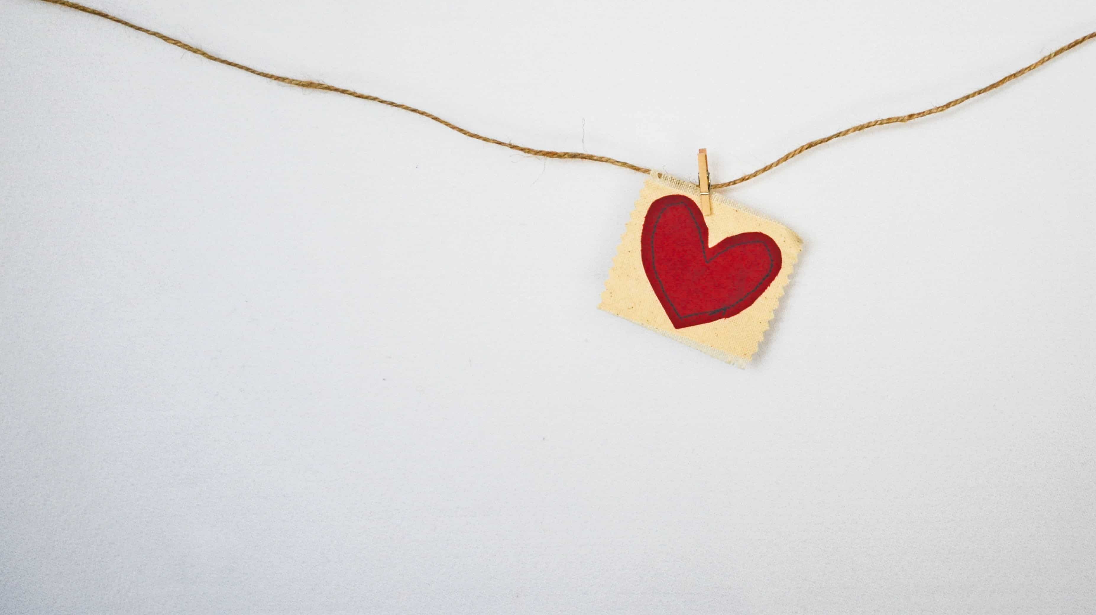 Fabric heart symbol  pegged on string