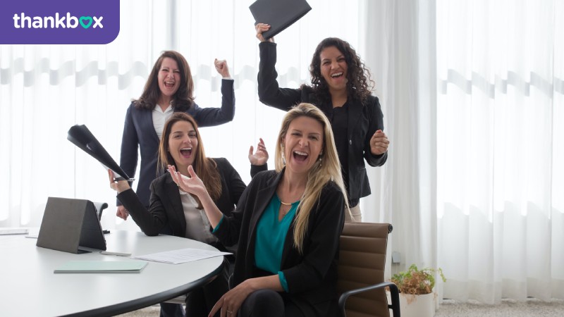 Happy businesswomen in a conference room