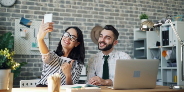 Man and a woman taking a selfie