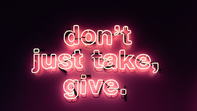 Neon sign Don't just take, give.