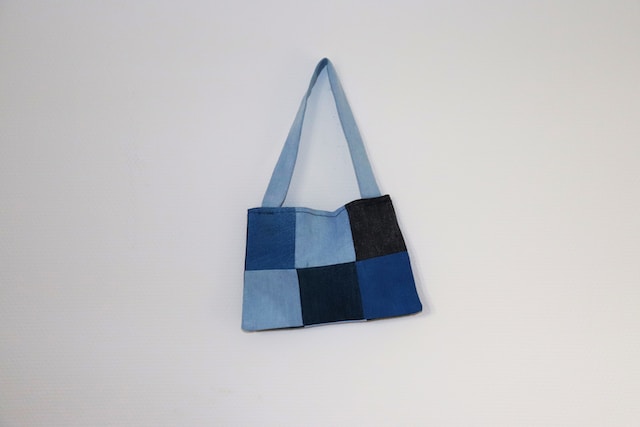 A blue checked tote bag