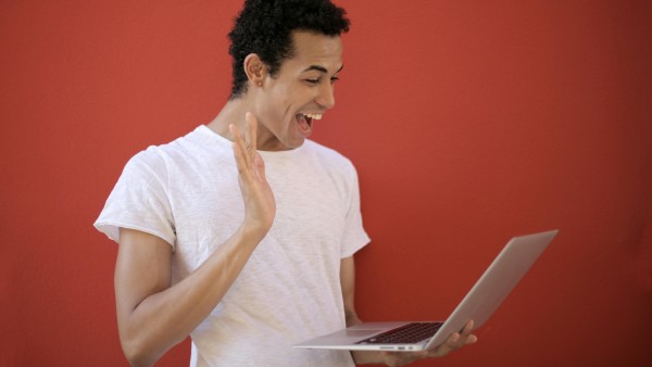 Cheerful man in a video call