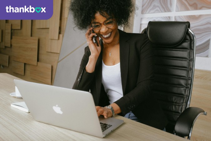 Woman In Black Blazer Sitting On Black Office Chair