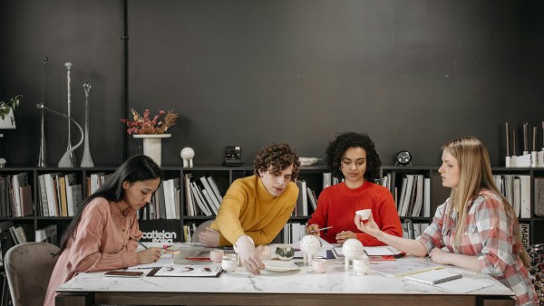 Team sitting at the table