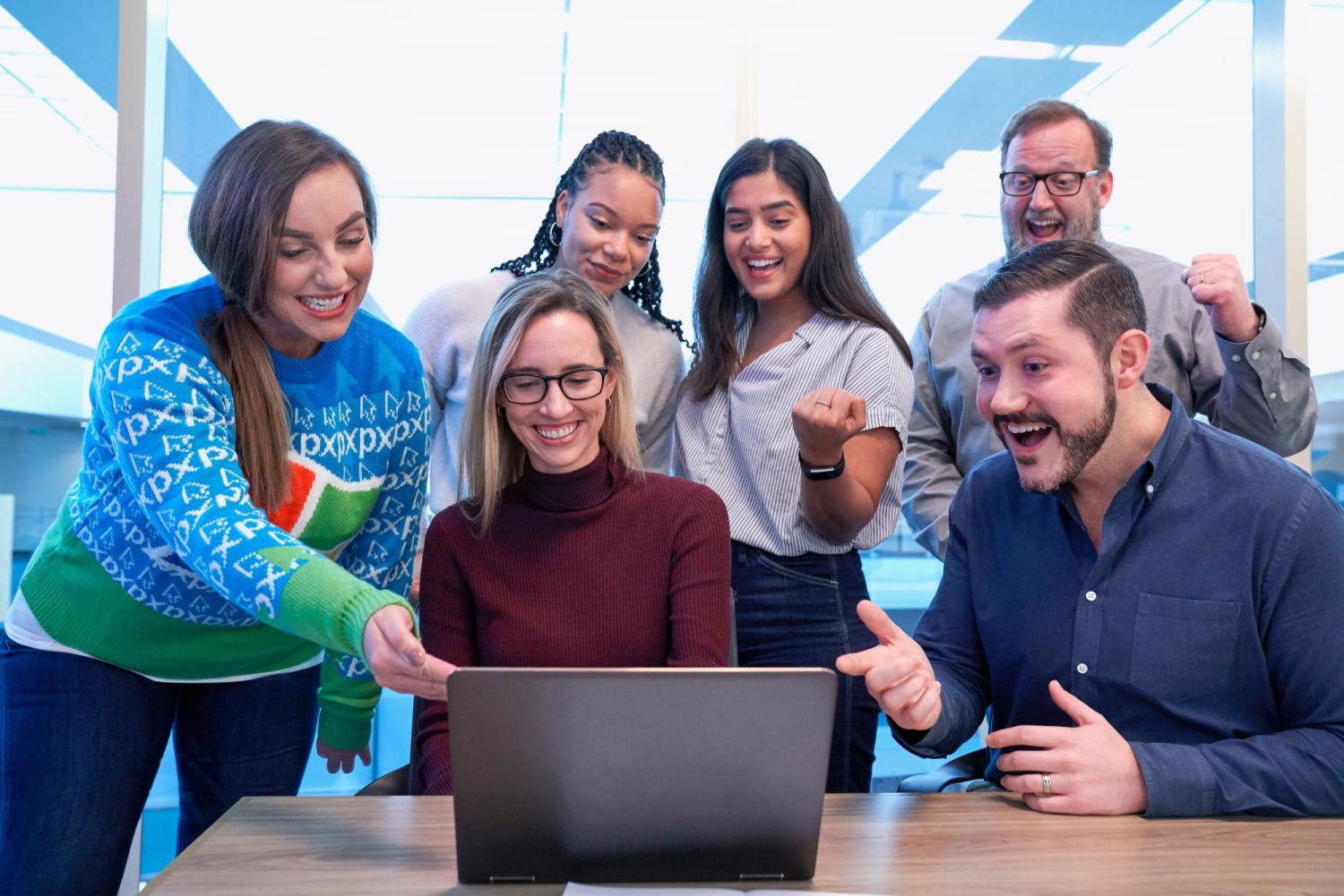 Colleagues and Co-workers Looking at Group Card