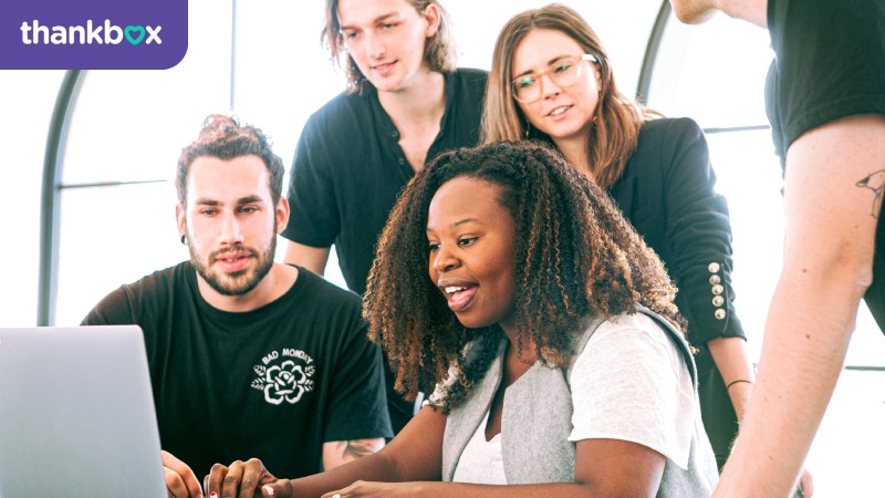 Woman sharing her presentation with her colleagues