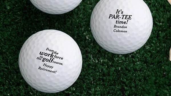 Retirement-themed golf balls