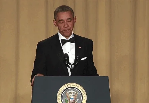 GIG of President Barack Obama in black tie dress and his mic drop at the podium 