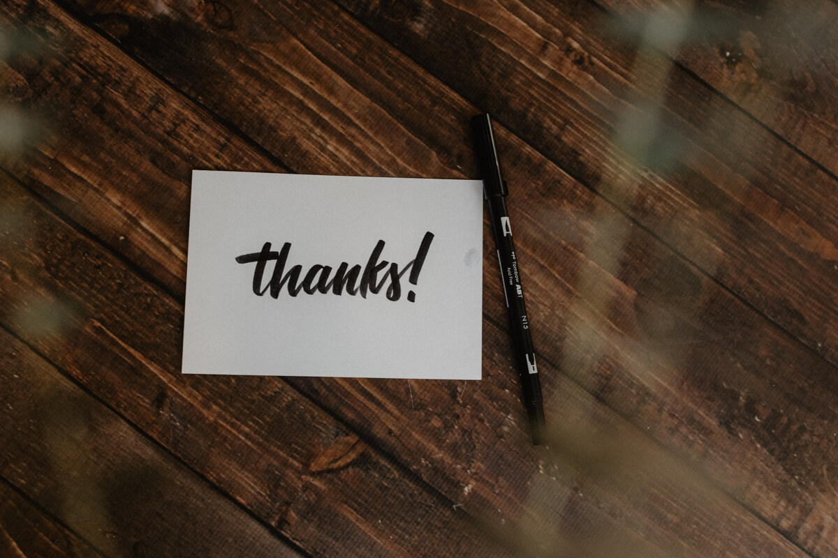 Thanks message on wooden table