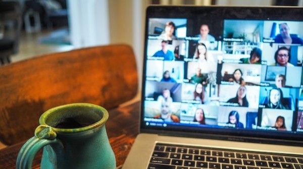 Online meeting in progress on a Macbook