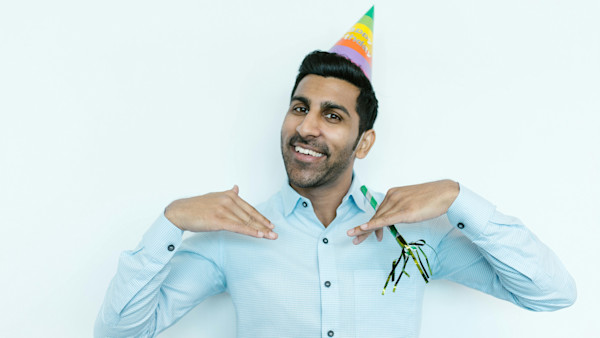 Man wearing a party hat