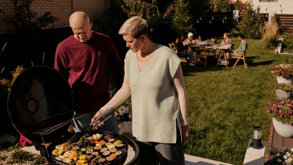 A couple making barbeque