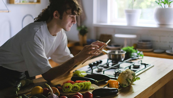 Young chef cooking in a kitchen