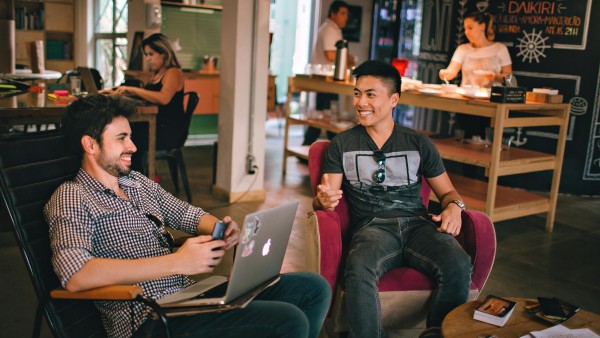 Men having a conversation in a café