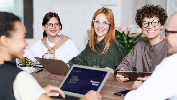 Happy females wearing glasses