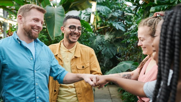 People having fist bumps