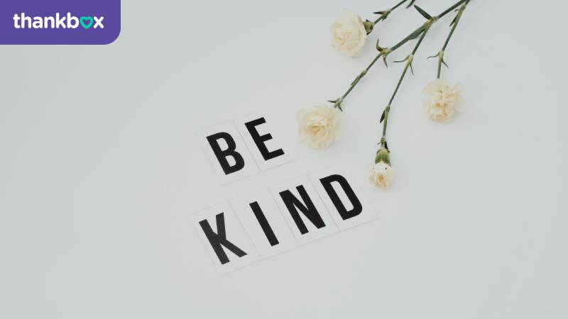 Be Kind Lettering on White Surface