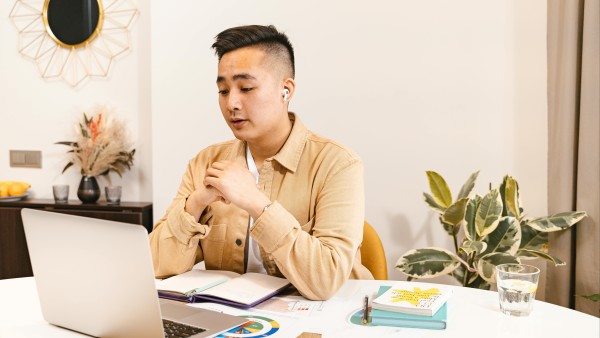 Man in a virtual meeting in an aesthetic setting