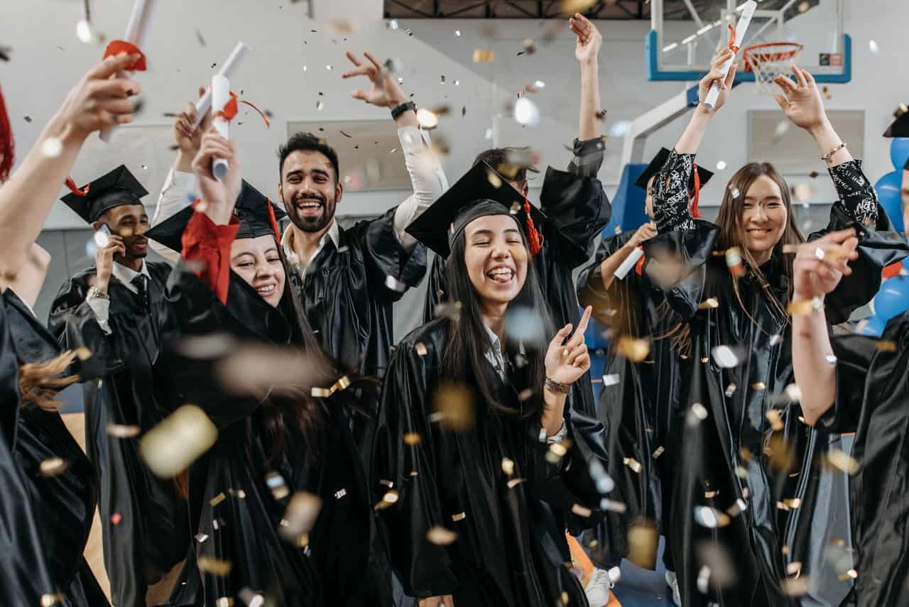 An image of a class celebrating its graduation.