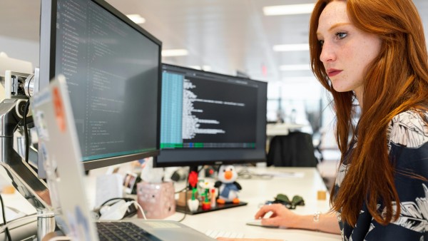 Woman coding on a computer