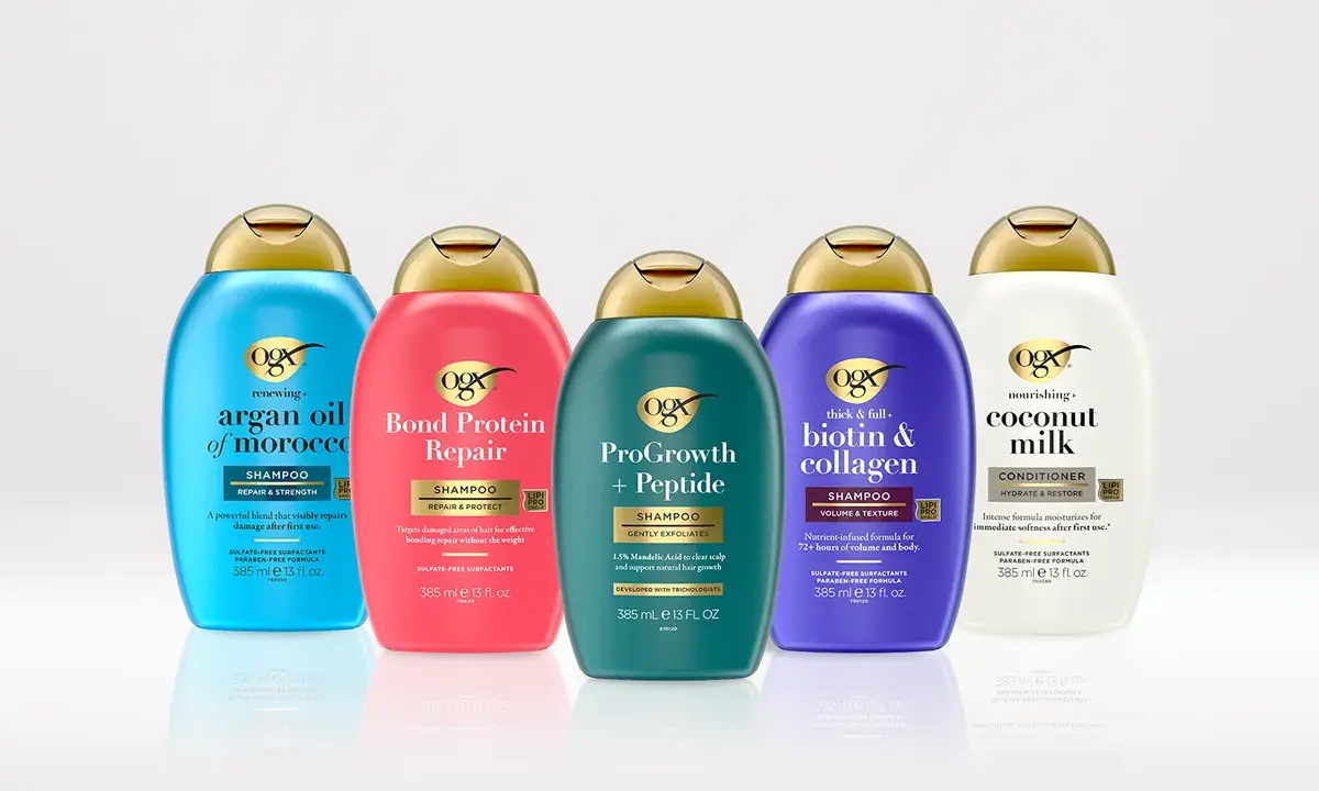 Image displaying assorted OGX® Beauty shampoos and conditioners