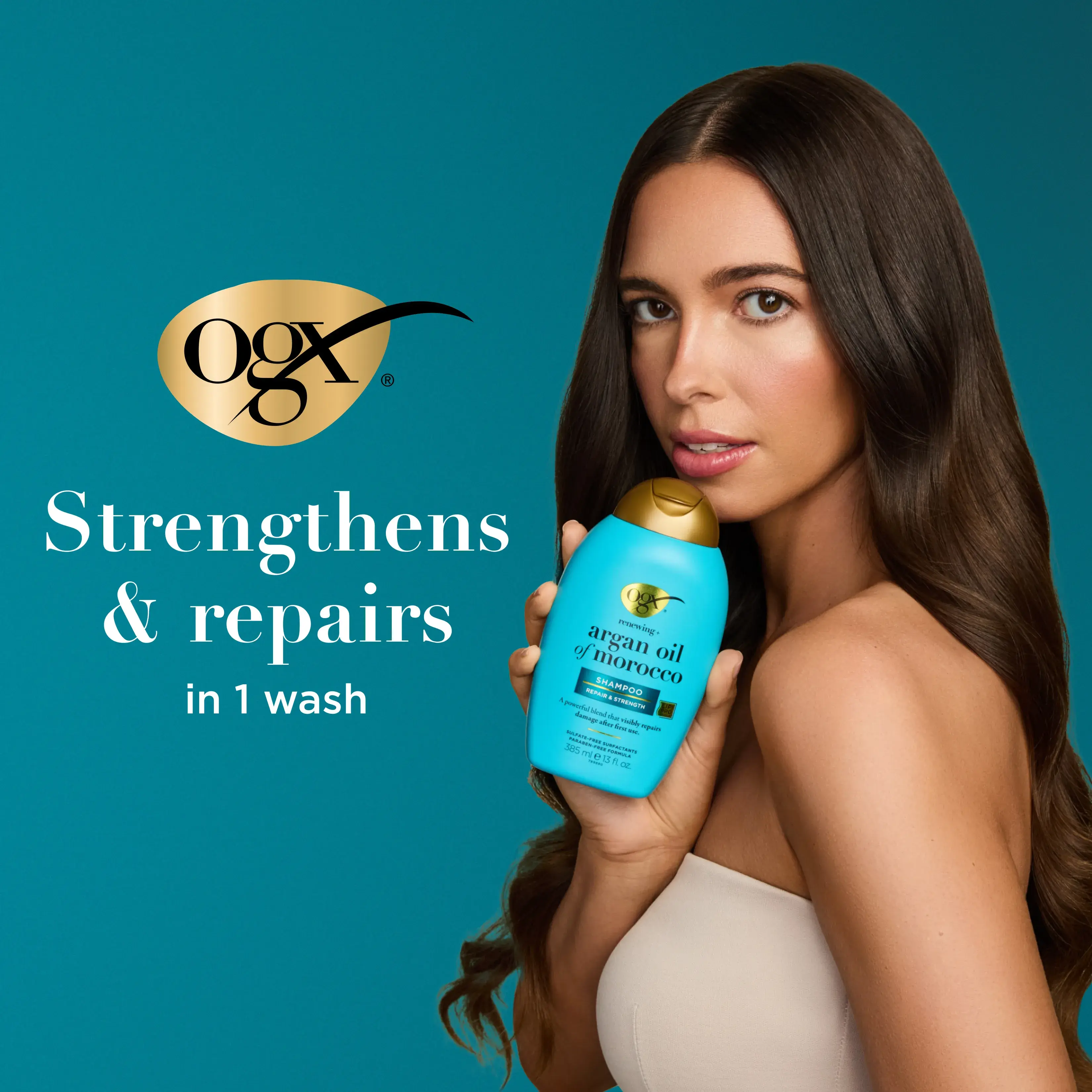 Woman holding Argan Oil of Morocco Shampoo. Strengthens and Repairs in 1 wash