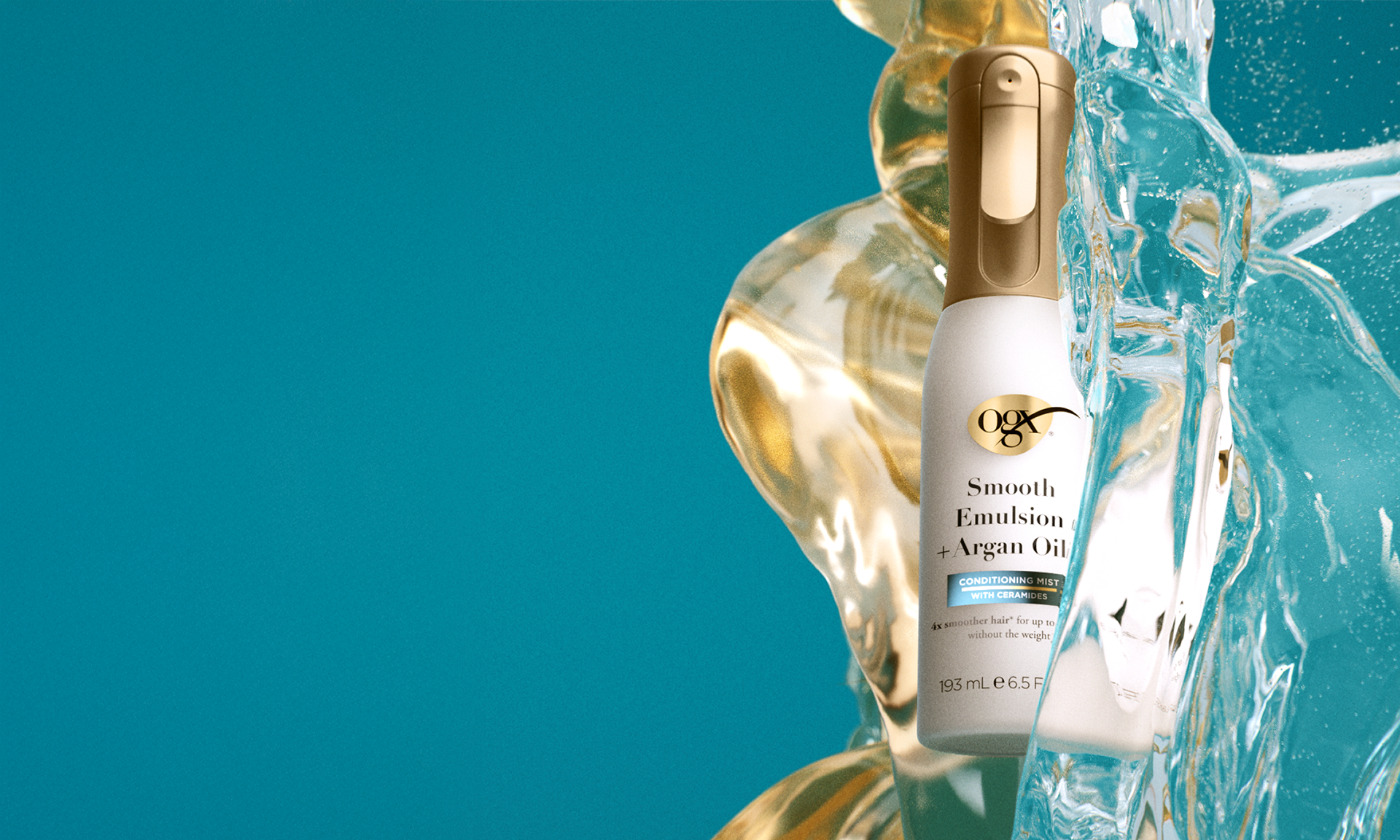 Bottle of Smooth Emulsion + Argan Oil Conditioning Mist being splashed and covered in oil