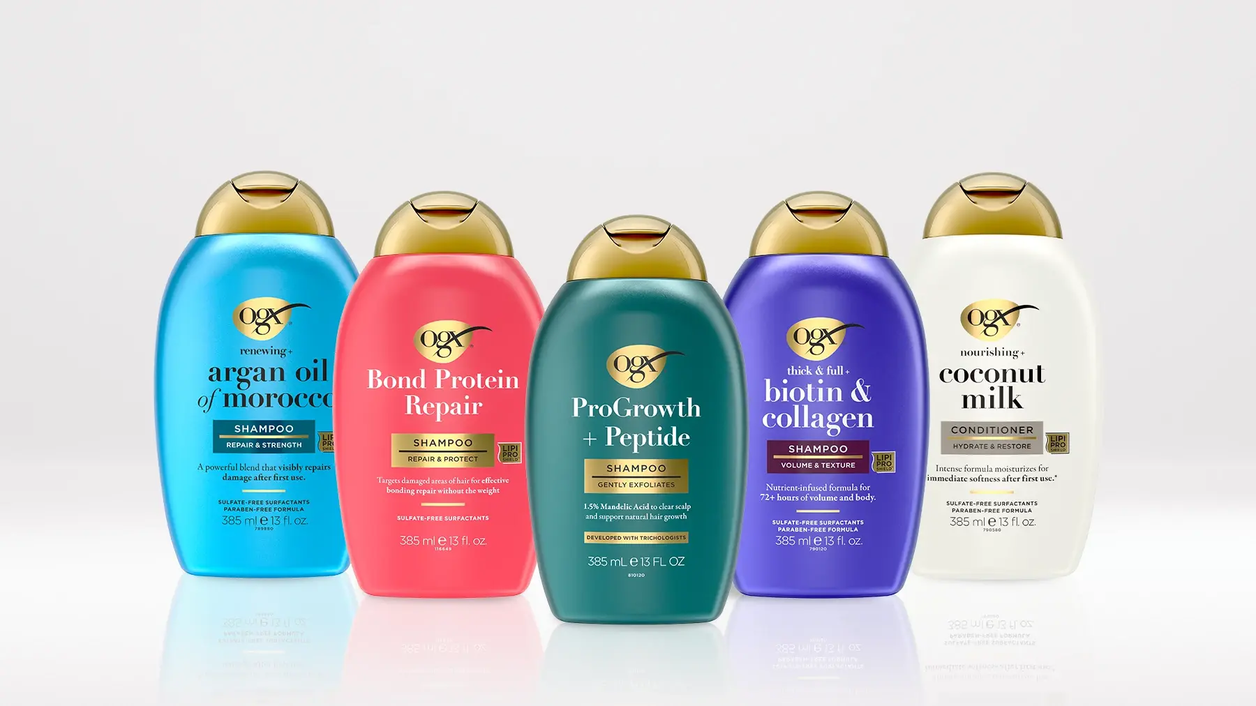 Image displaying assorted OGX® Beauty shampoos and conditioners