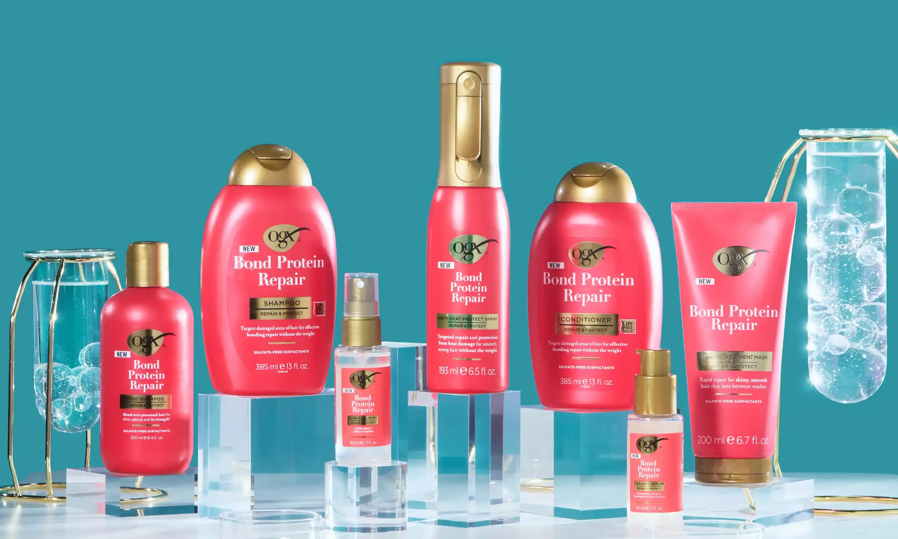 OGX® Bond Protein Repair Product Line with the Heat Protect Spray at the center