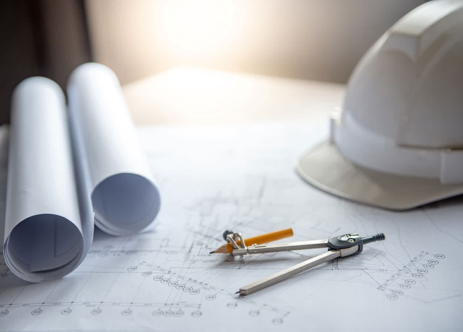 Building Plans, Compass, and Hard Hat