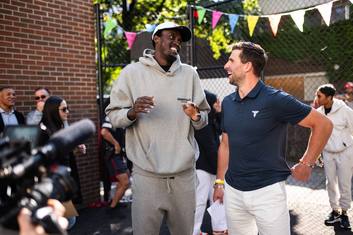 Pascal Siakam and John Tavares laughing