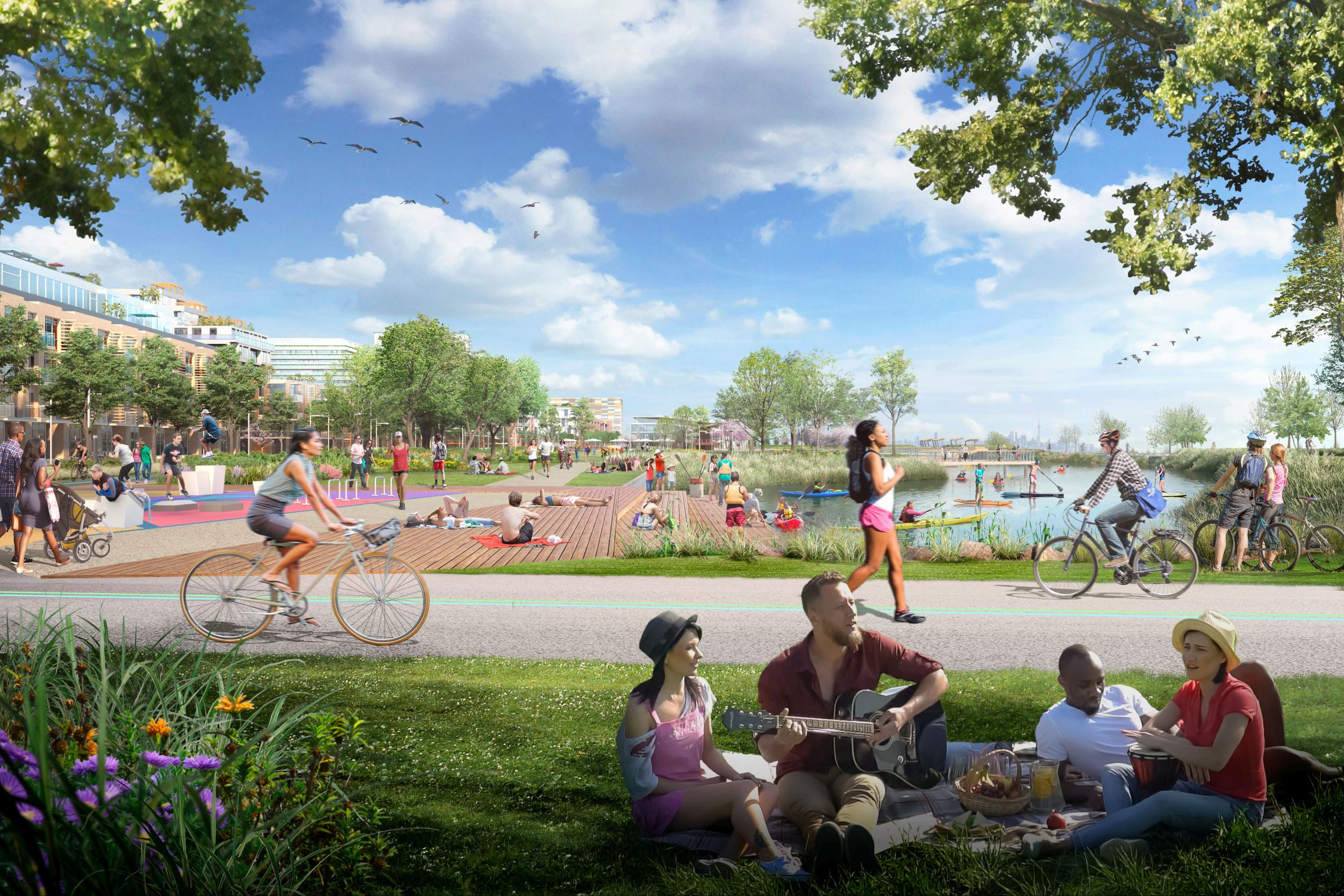 Group Picnicking on Grass Beside Multi-use Trail