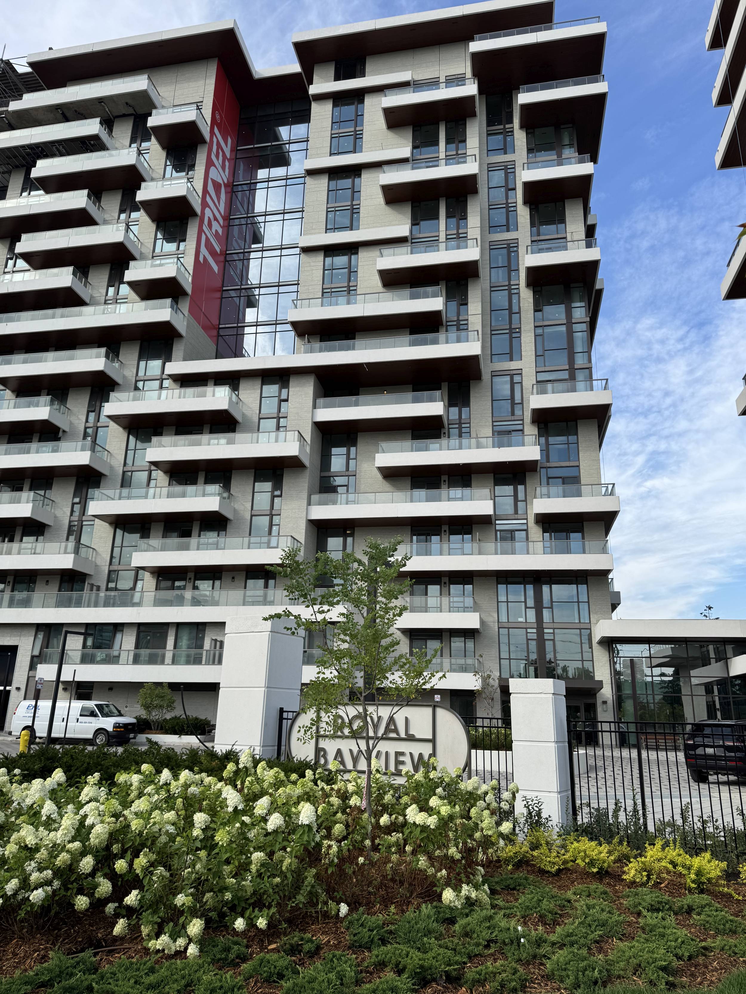 Royal Bayview sign and garden near entrance to the community.
