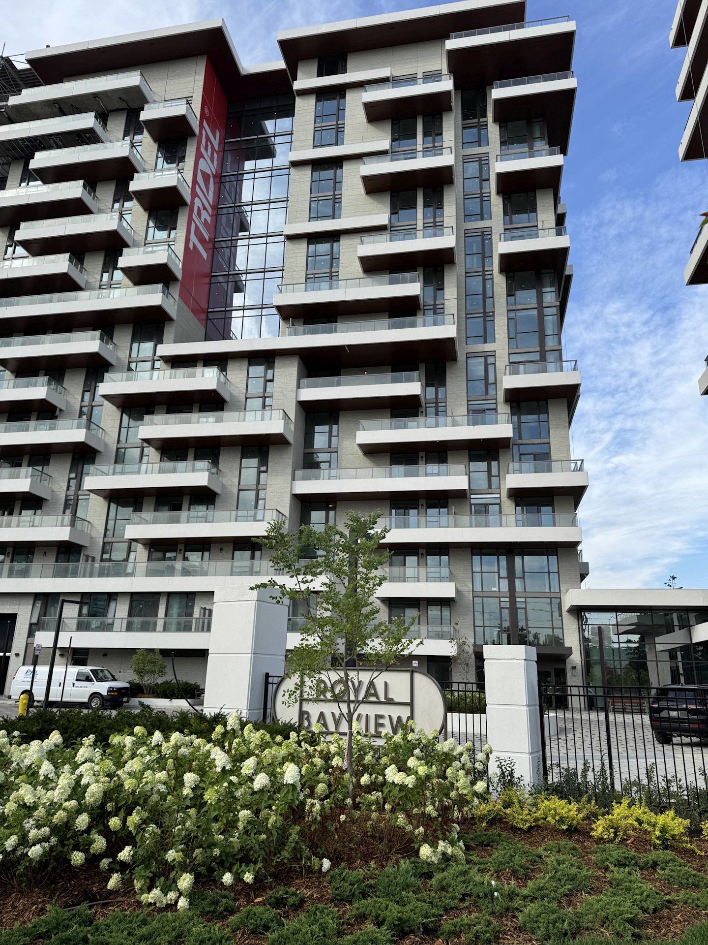 Royal Bayview sign and garden near entrance to the community.