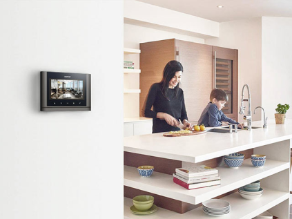 A mom and child cooking in the kitchen