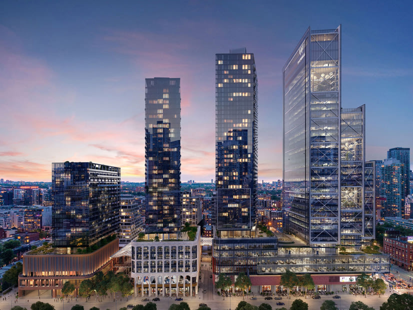 A Skyline View of The Well Condo building at Dusk