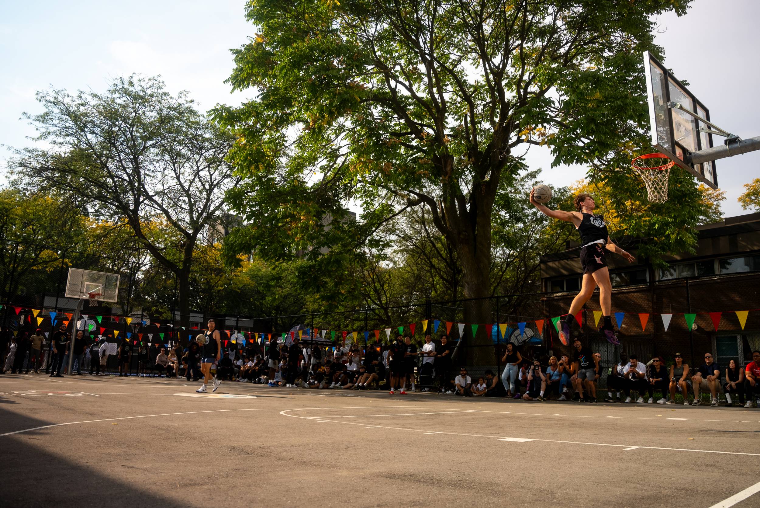 A participant dunking the basketball