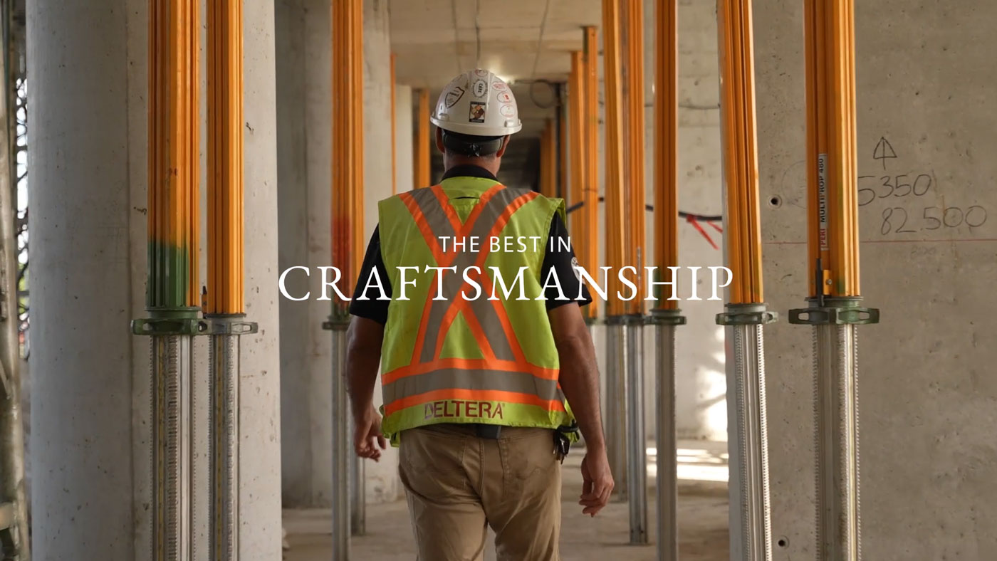 Site super walking through construction site