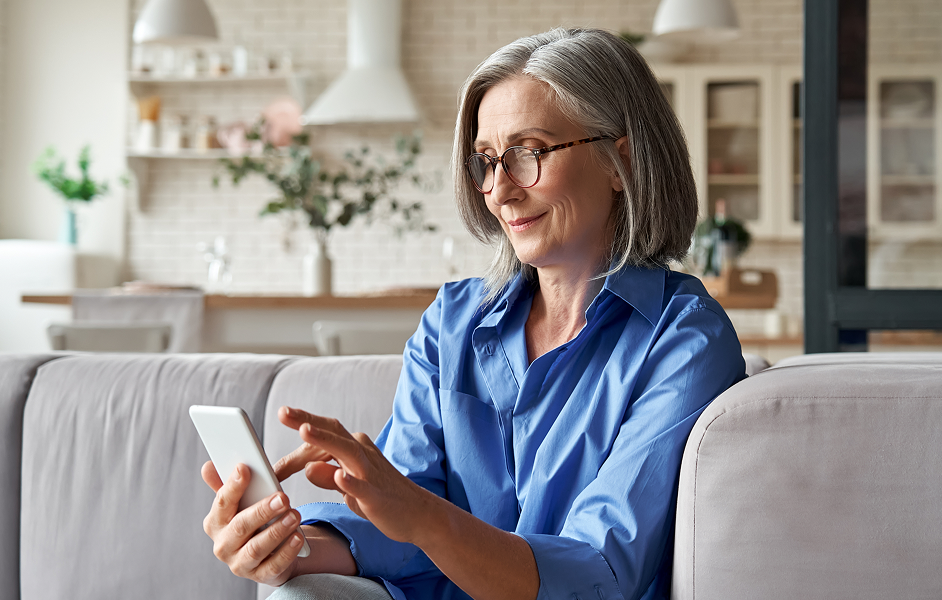 Senior woman looking at her smartphone