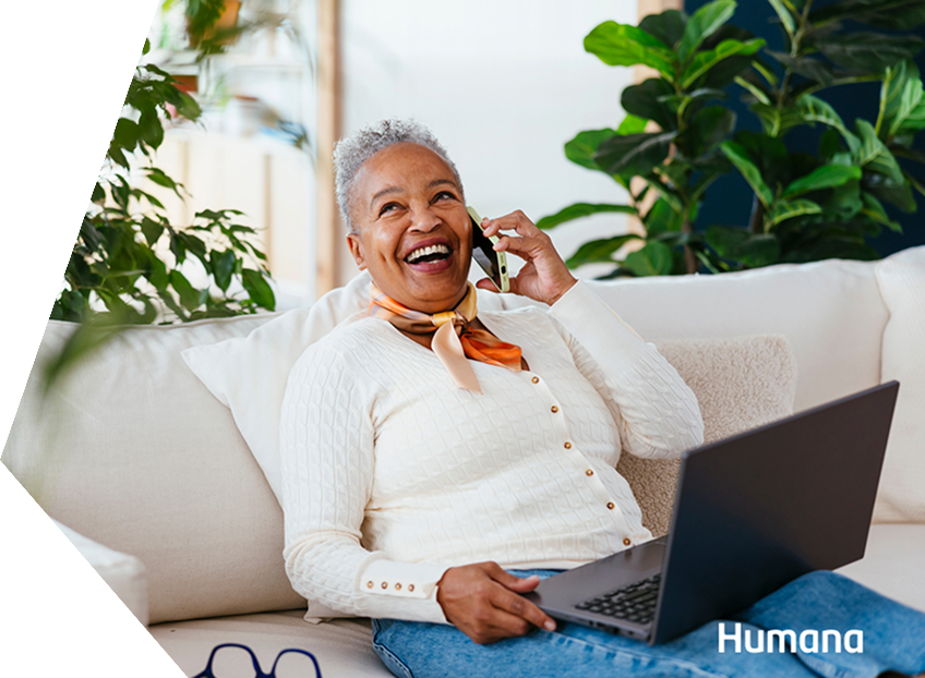 Cheerful woman talking on smartphone